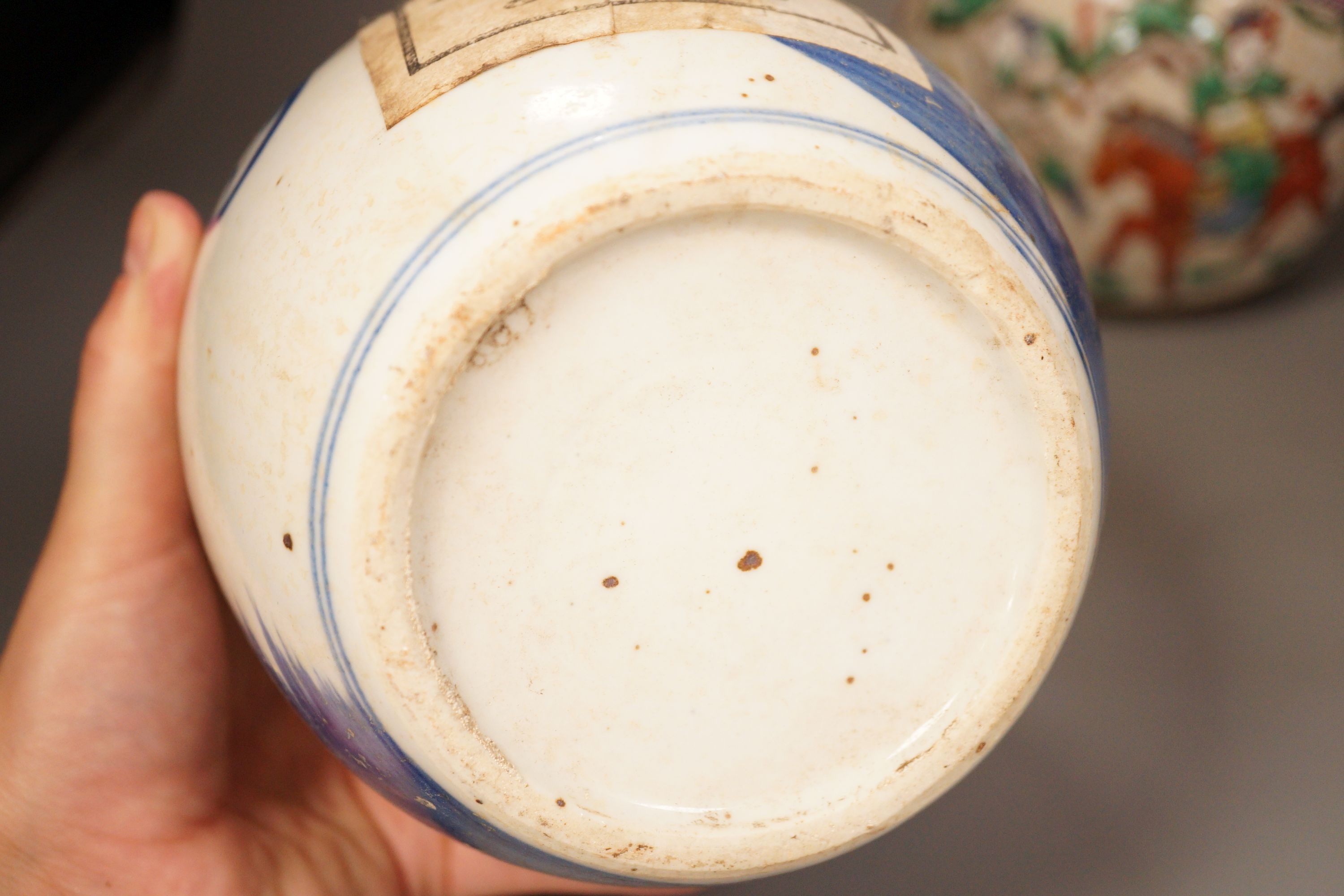 A Chinese crackleglaze famille rose jar and two blue and white jars, 16cm